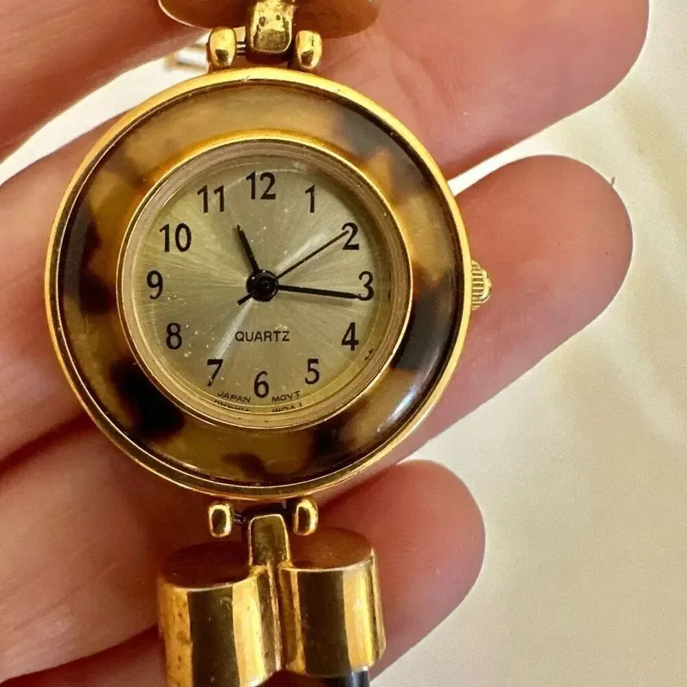 Avon faux tortoise vintage watch/ bracelet.